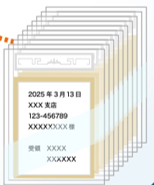 重ねられた予備鍵の入った封筒